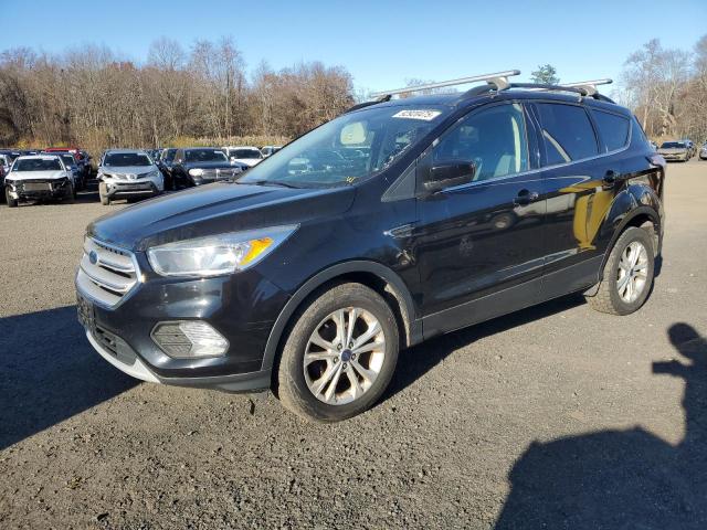 Photo 1 from auction – 2018 FORD ESCAPE SE with VIN 1FMCU0GDXJUA43485
