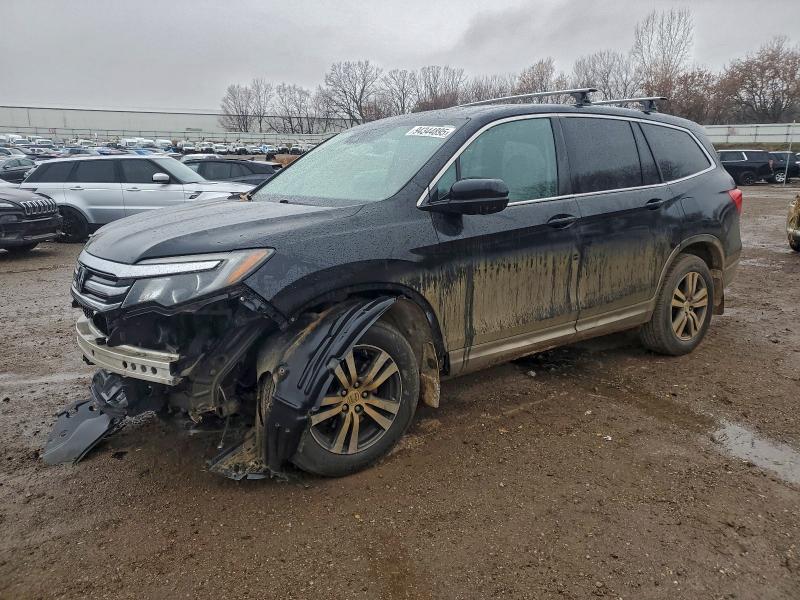 HONDA PILOT EXL 2016 with VIN 5FNYF6H60GB025134 - Photo from auction