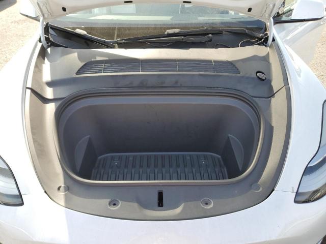 Photo 11 from auction – 2022 TESLA MODEL Y with VIN 7SAYGDEEXNF411086