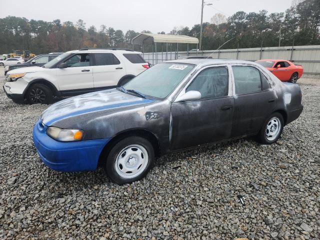 TOYOTA COROLLA 2000 مع رقم تعريف المركبة 1NXBR12E0YZ323798 - صورة من المزاد