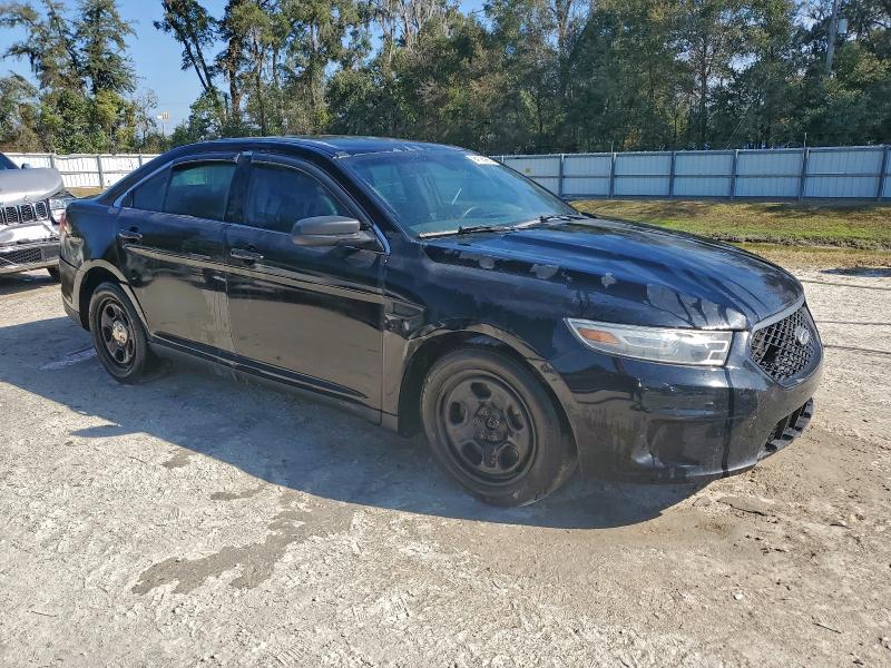 Photo 4 from auction – 2014 FORD TAURUS POL with VIN 1FAHP2MK3EG138268