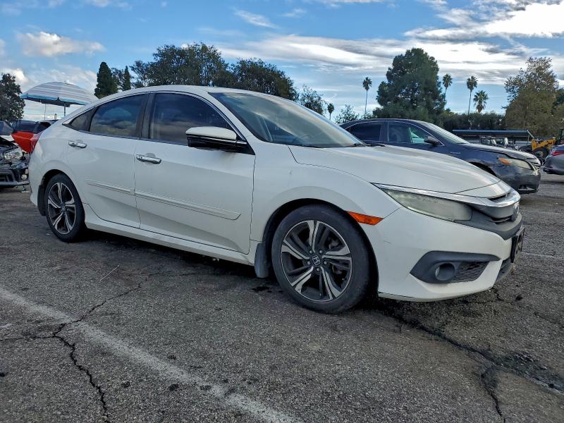 Photo 4 from auction – 2016 HONDA CIVIC TOUR with VIN 19XFC1F97GE200968
