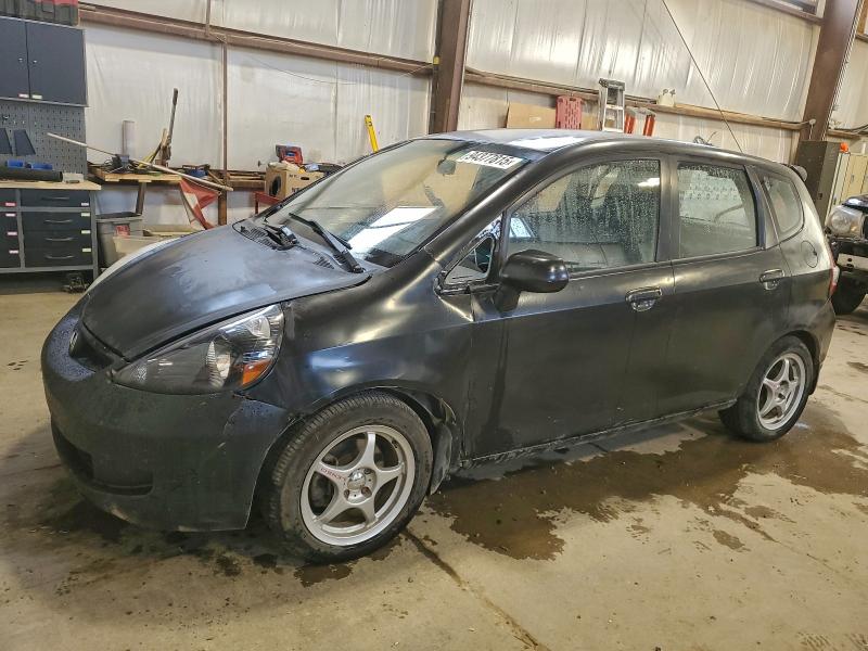 HONDA FIT 2007 with VIN JHMGD38407S801570 - Photo from auction