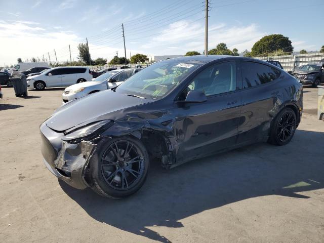 TESLA MODEL Y 2024 with VIN 7SAYGDED3RF036722 - Photo from auction