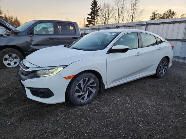 Photo 1 from auction – 2018 HONDA CIVIC LX with VIN 2HGFC2F66JH009728
