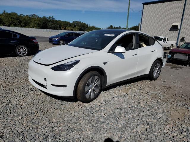 TESLA MODEL Y 2024 with VIN 7SAYGDEE6RA265515 - Photo from auction