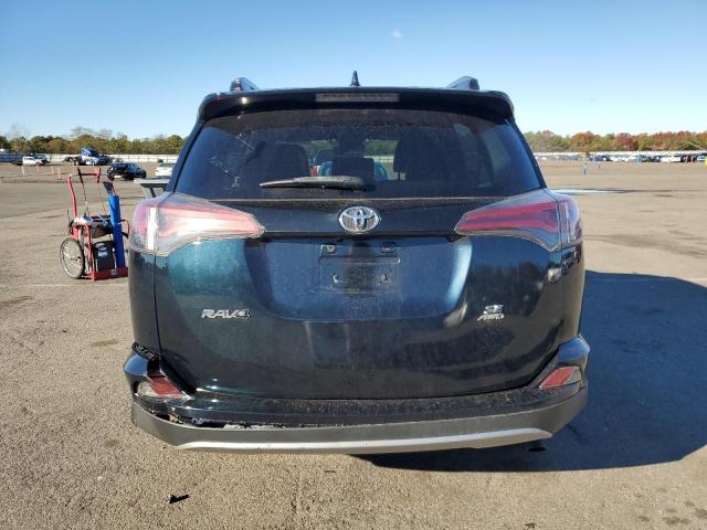 Photo 6 from auction – 2018 TOYOTA RAV4 SE with VIN JTMJFREV8JD236983