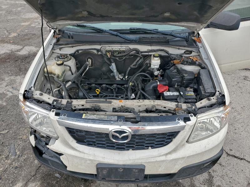 Photo 12 from auction – 2011 MAZDA TRIBUTE with VIN 4F2CY0C76BKM04927