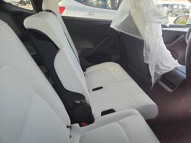 Photo 10 from auction – 2025 TESLA MODEL Y with VIN 7SAYGAEE8SF251123