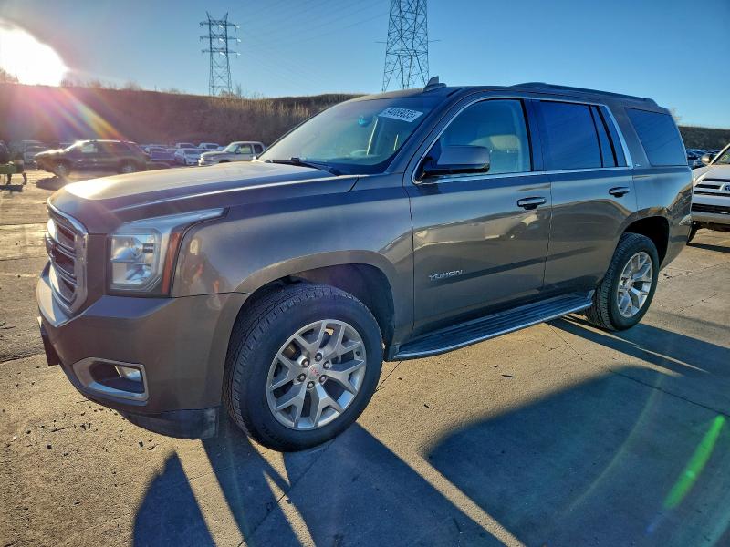 GMC YUKON 2015 with VIN 1GKS2BKC9FR600661 - Photo from auction