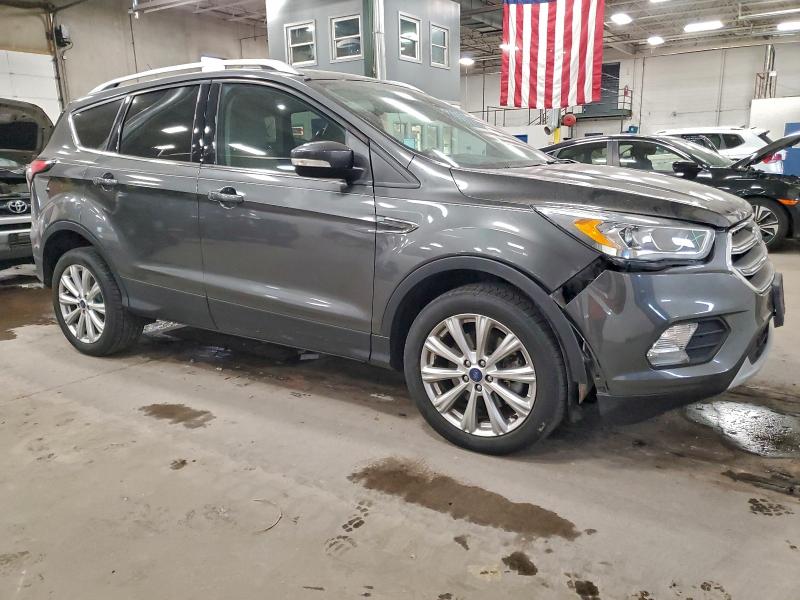 Photo 4 from auction – 2017 FORD ESCAPE TIT with VIN 1FMCU9JD7HUB71853