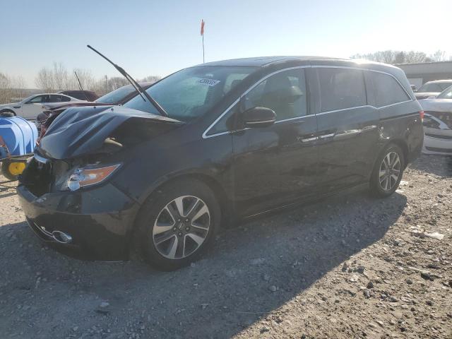 HONDA ODYSSEY 2014 with VIN 5FNRL5H98EB105750 - Photo from auction