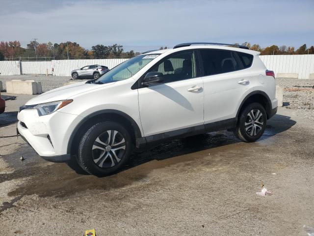 TOYOTA RAV4 LE 2017 with VIN JTMZFREV4HJ704075 - Photo from auction
