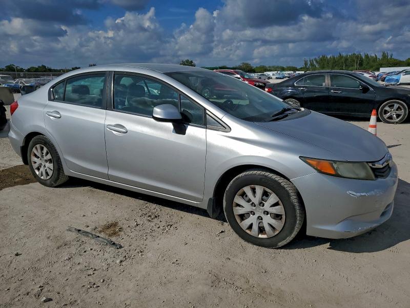 Photo 4 from auction – 2012 HONDA CIVIC LX with VIN 19XFB2F55CE316413
