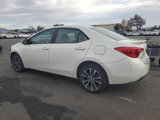 Photo 2 from auction – 2018 TOYOTA COROLLA L with VIN 5YFBURHE9JP803723