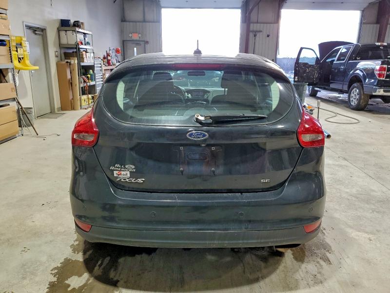Photo 6 from auction – 2015 FORD FOCUS SE with VIN 1FADP3K29FL303837