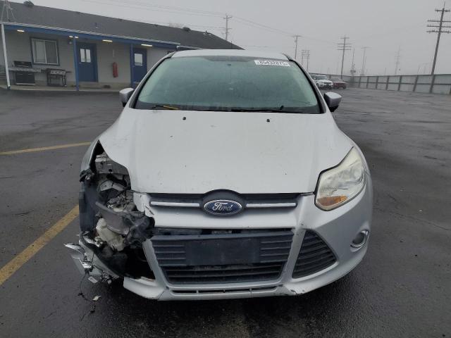 Foto 5 de la subasta – 2014 FORD FOCUS SE con VIN 1FADP3K26EL270519