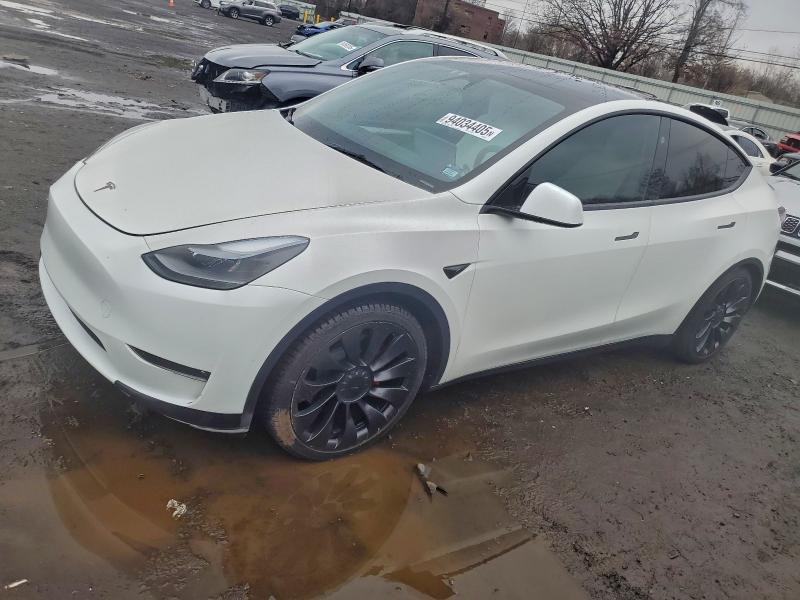 TESLA MODEL Y 2023 with VIN 7SAYGDEF4PF980043 - Photo from auction