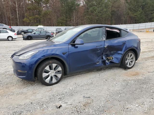TESLA MODEL Y 2023 with VIN 7SAYGDEE4PF799483 - Photo from auction