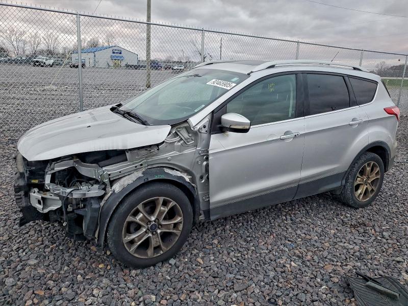 FORD ESCAPE TIT 2015 with VIN 1FMCU0JX7FUA38884 - Photo from auction