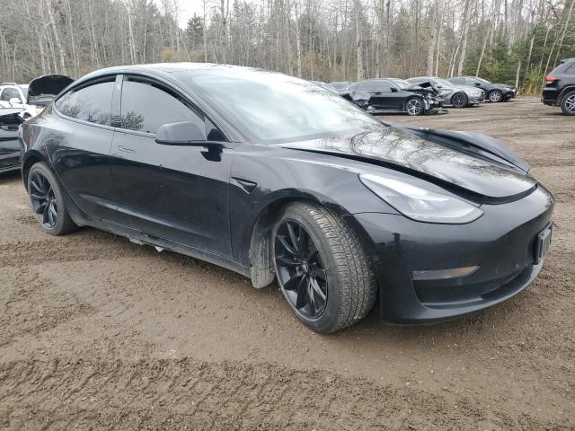 Photo 4 from auction – 2021 TESLA MODEL 3 with VIN 5YJ3E1EA4MF062126