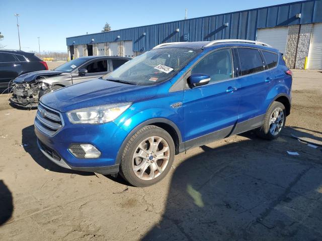 FORD ESCAPE TIT 2017 with VIN 1FMCU0JDXHUE69972 - Photo from auction