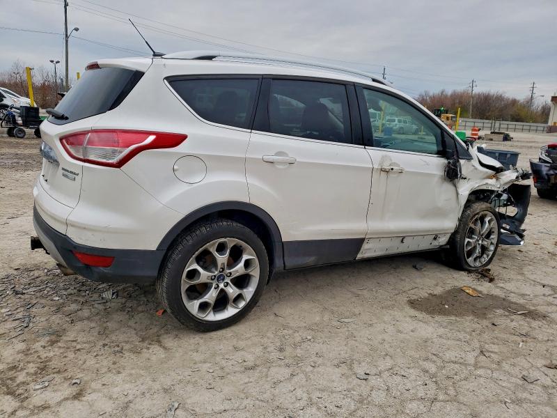 Photo 3 from auction – 2016 FORD ESCAPE TIT with VIN 1FMCU0J98GUC76469