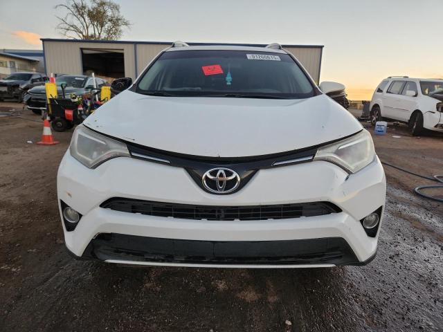Photo 5 from auction – 2016 TOYOTA RAV4 XLE with VIN 2T3RFREV6GW463460