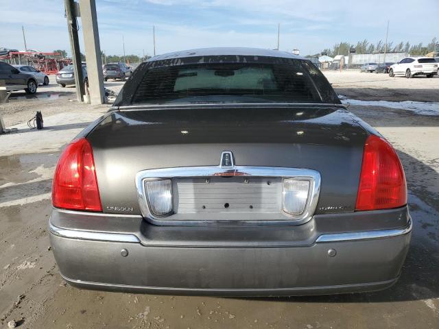 Photo 6 from auction – 2004 LINCOLN TOWN CAR E with VIN 1LNHM81W54Y627725