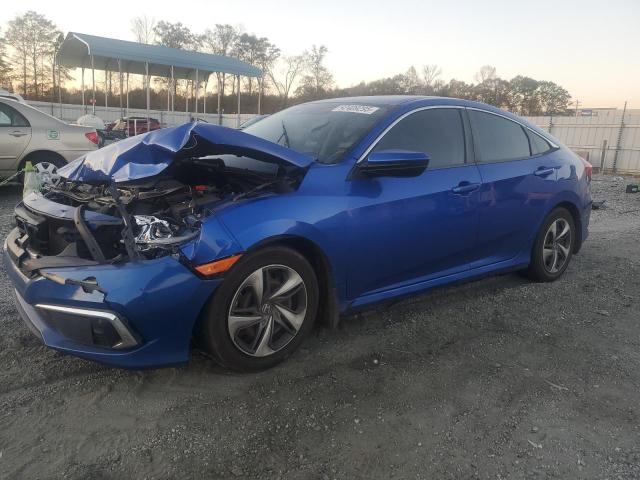 HONDA CIVIC LX 2019 with VIN 19XFC2F66KE030137 - Photo from auction
