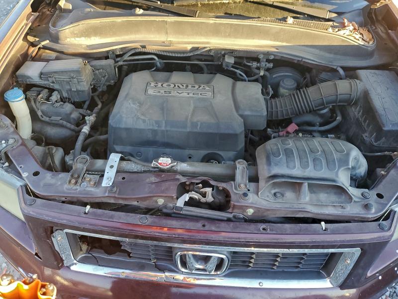 Photo 11 from auction – 2007 HONDA RIDGELINE with VIN 2HJYK16317H507673