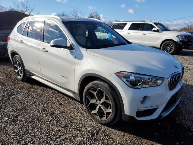 Photo 4 from auction – 2017 BMW X1 XDRIVE2 with VIN WBXHT3C36H5F85558