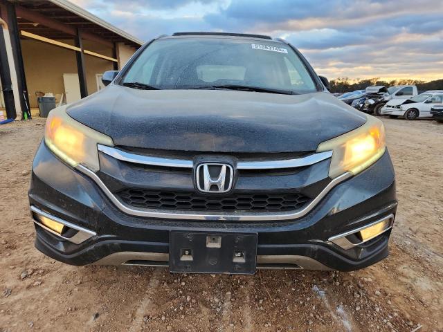 Photo 5 from auction – 2015 HONDA CR-V EXL with VIN 2HKRM3H77FH527320