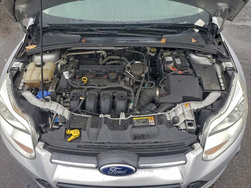 Photo 11 from auction – 2013 FORD FOCUS SE with VIN 1FADP3F20DL107907