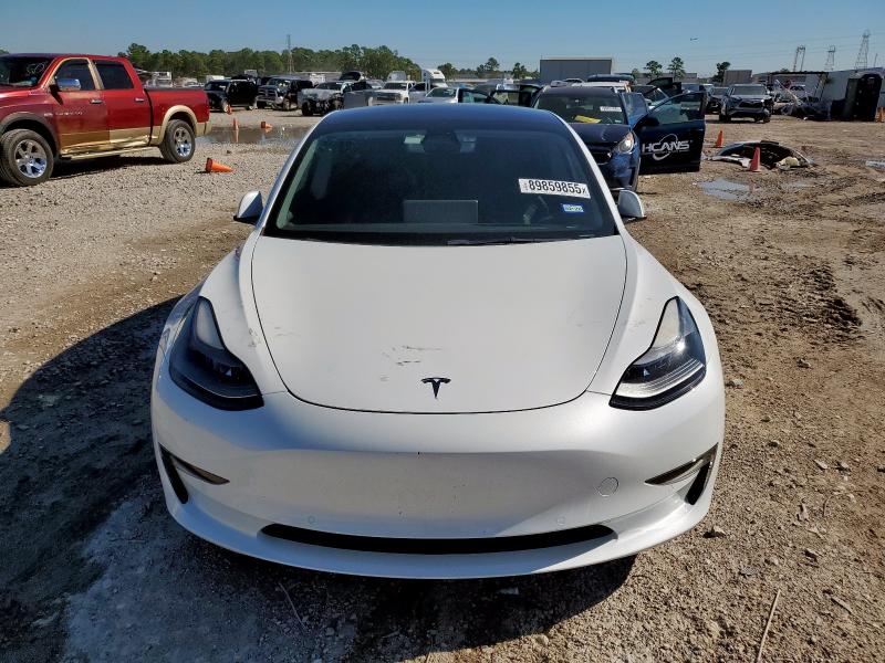 Photo 5 from auction – 2022 TESLA MODEL 3 with VIN 5YJ3E1EAXNF115381