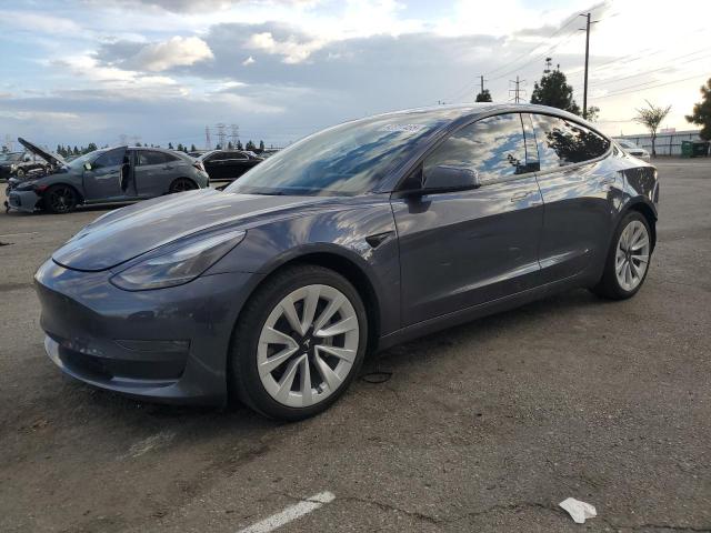 TESLA MODEL 3 2022 with VIN 5YJ3E1EAXNF232152 - Photo from auction