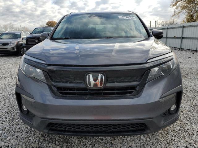 Photo 5 from auction – 2022 HONDA PILOT SE with VIN 5FNYF6H23NB080638