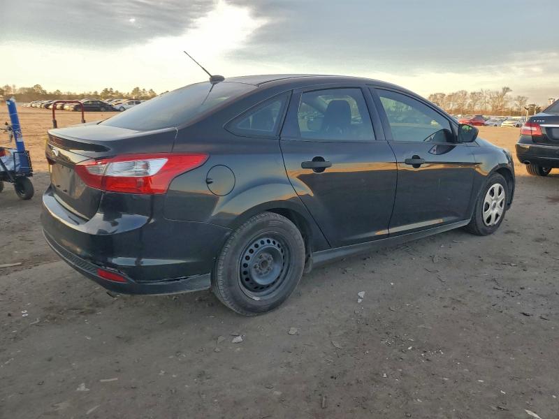 Photo 3 from auction – 2014 FORD FOCUS S with VIN 1FADP3E25EL191824