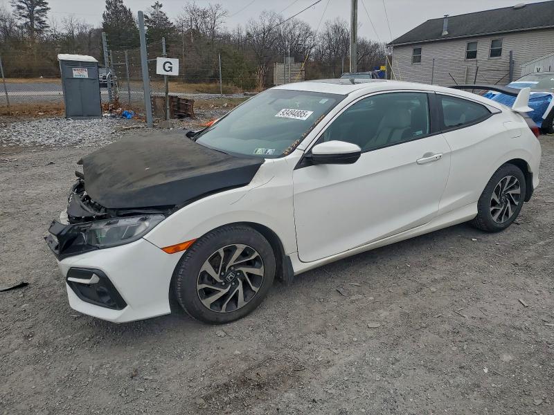 HONDA CIVIC LX 2018 with VIN 2HGFC4B04JH309510 - Photo from auction