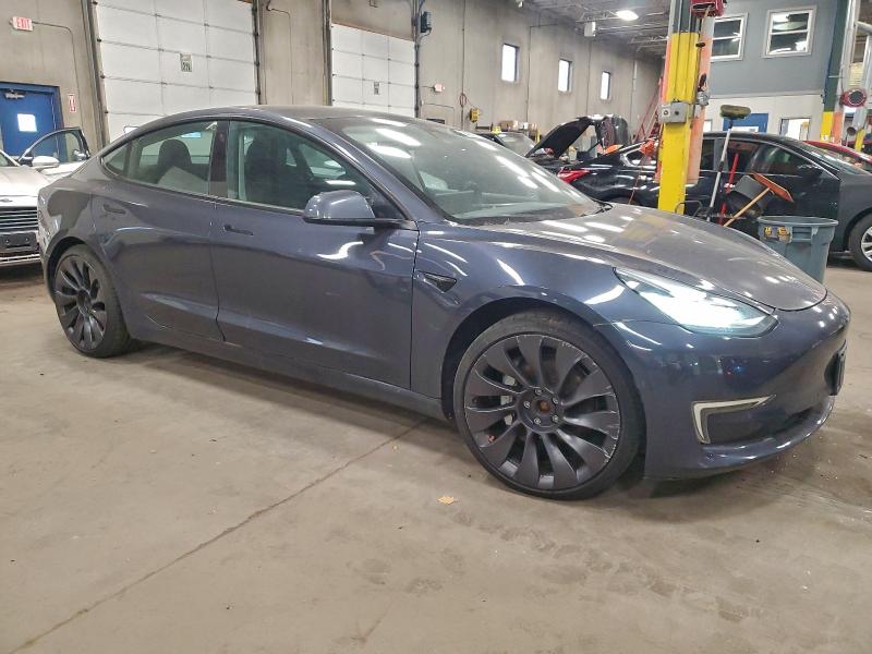 Photo 4 from auction – 2022 TESLA MODEL 3 with VIN 5YJ3E1EB7NF185946