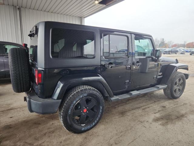 Photo 3 from auction – 2011 JEEP WRANGLER U with VIN 1J4HA5H17BL632676