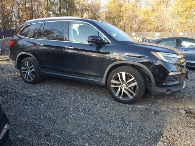 Photo 4 from auction – 2016 HONDA PILOT TOUR with VIN 5FNYF6H92GB081487