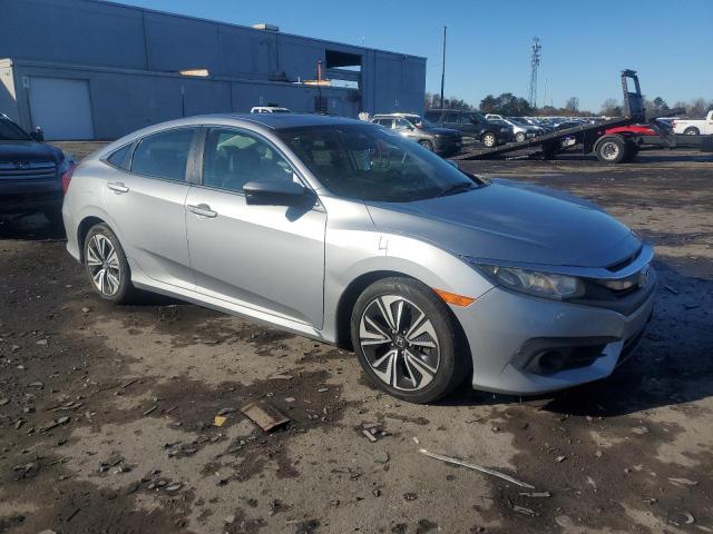 Photo 4 from auction – 2016 HONDA CIVIC EXL with VIN 19XFC1F73GE210959