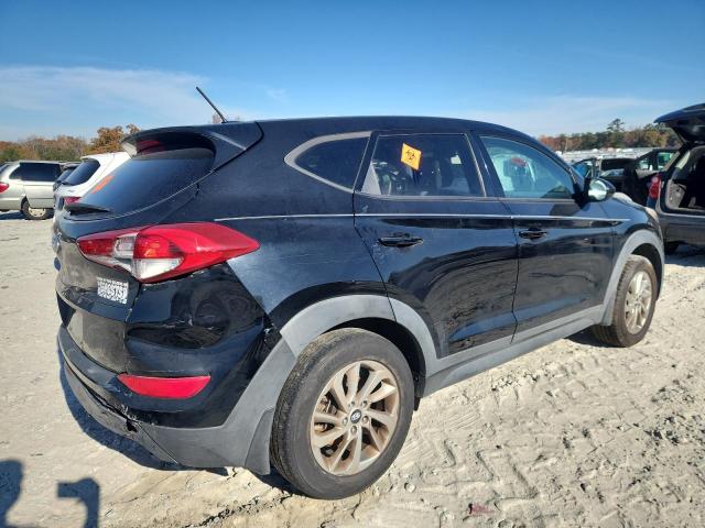 Photo 3 from auction – 2016 HYUNDAI TUCSON SE with VIN KM8J23A40GU242495