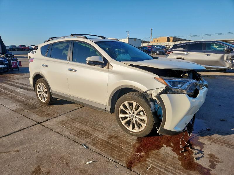 Photo 4 from auction – 2018 TOYOTA RAV4 LIMIT with VIN 2T3YFREV6JW509971