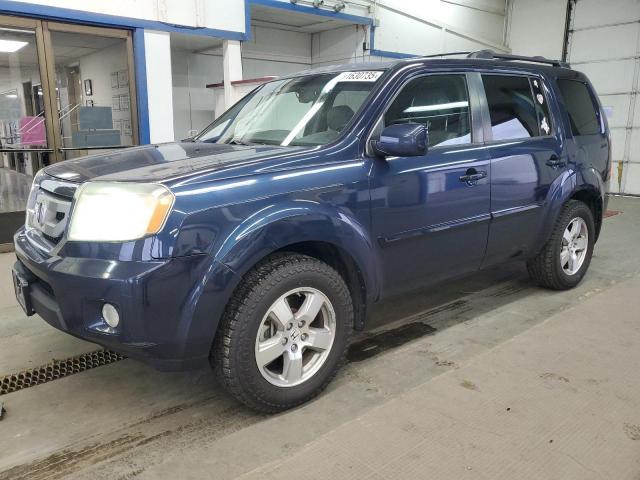HONDA PILOT EXLN 2011 with VIN 5FNYF4H72BB084501 - Photo from auction