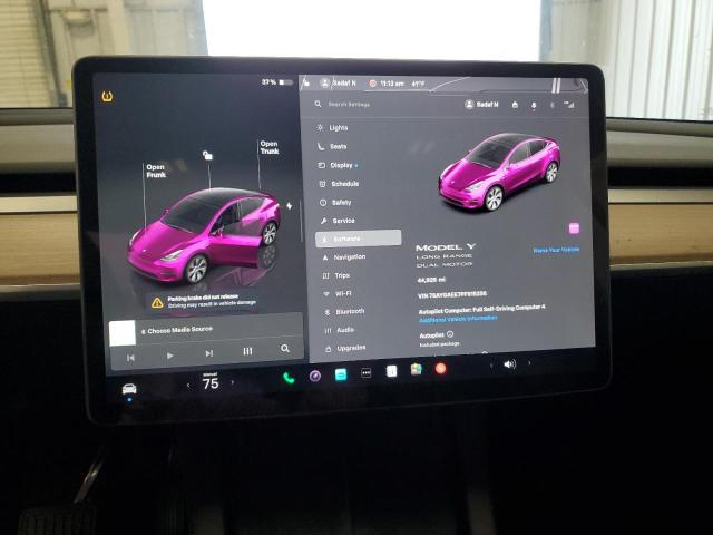 Photo 9 from auction – 2023 TESLA MODEL Y with VIN 7SAYGAEE7PF915256