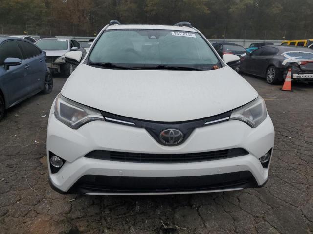 Photo 5 from auction – 2017 TOYOTA RAV4 XLE with VIN JTMWFREV4HJ704614