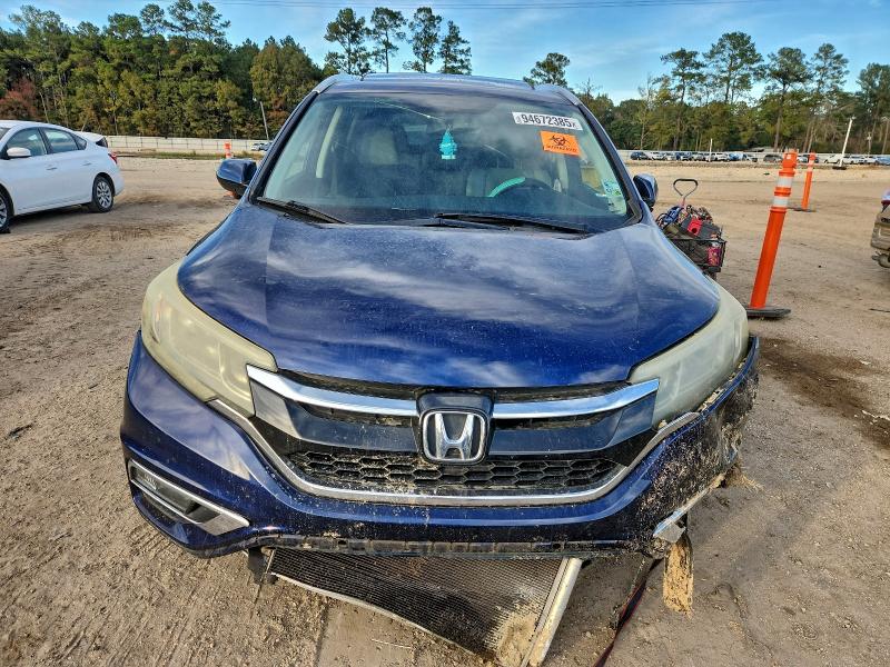 Photo 5 from auction – 2015 HONDA CR-V EXL with VIN 2HKRM3H77FH513577