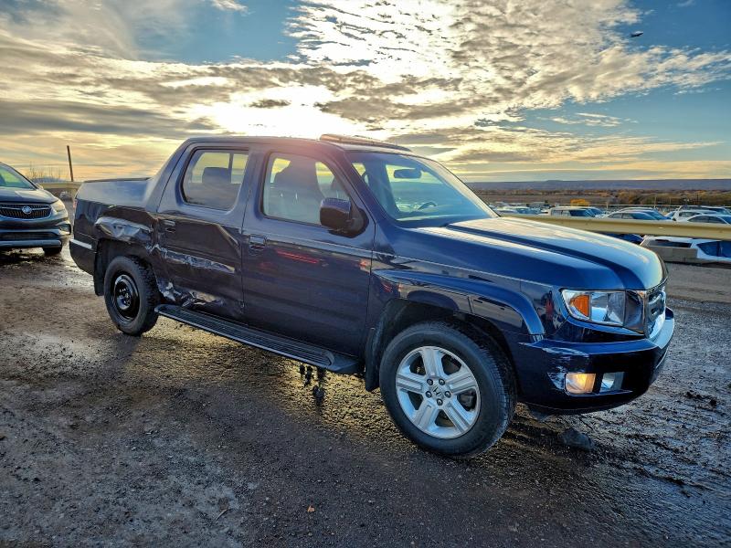Photo 4 from auction – 2010 HONDA RIDGELINE with VIN 5FPYK1F59AB009747